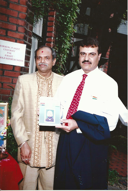 HEMANT PADHYA AND MAJOJ PATANI LAUCHING A SOUVERIR OF PANDIT SHYAMAJI KRISHNAVARMA